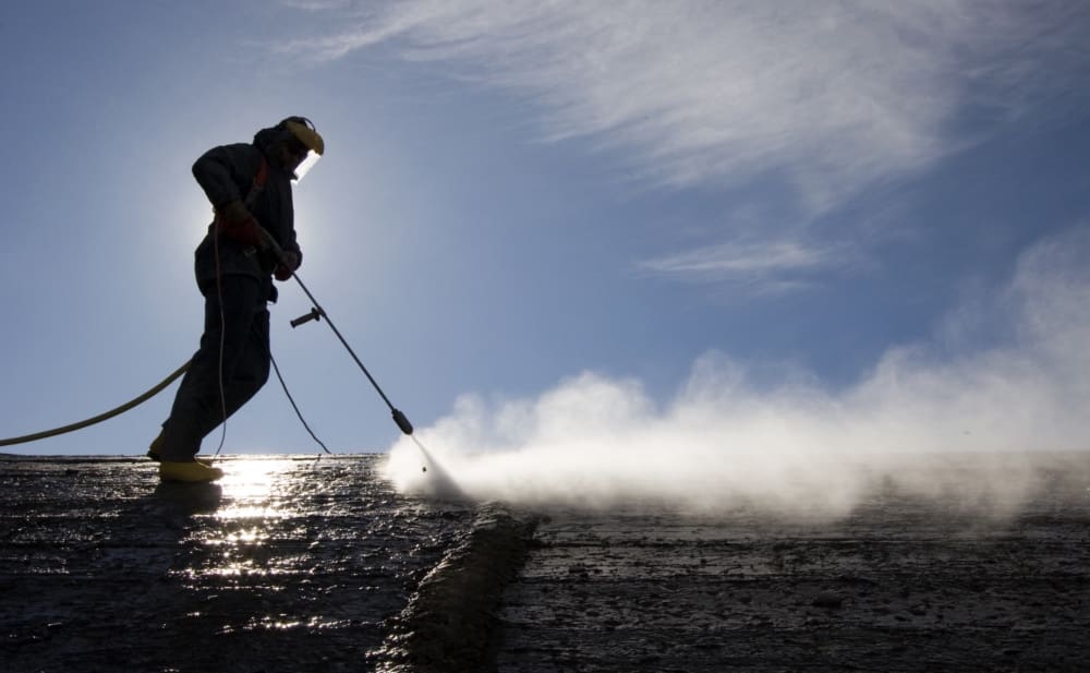 Bringman Roofing, cleaning roof image